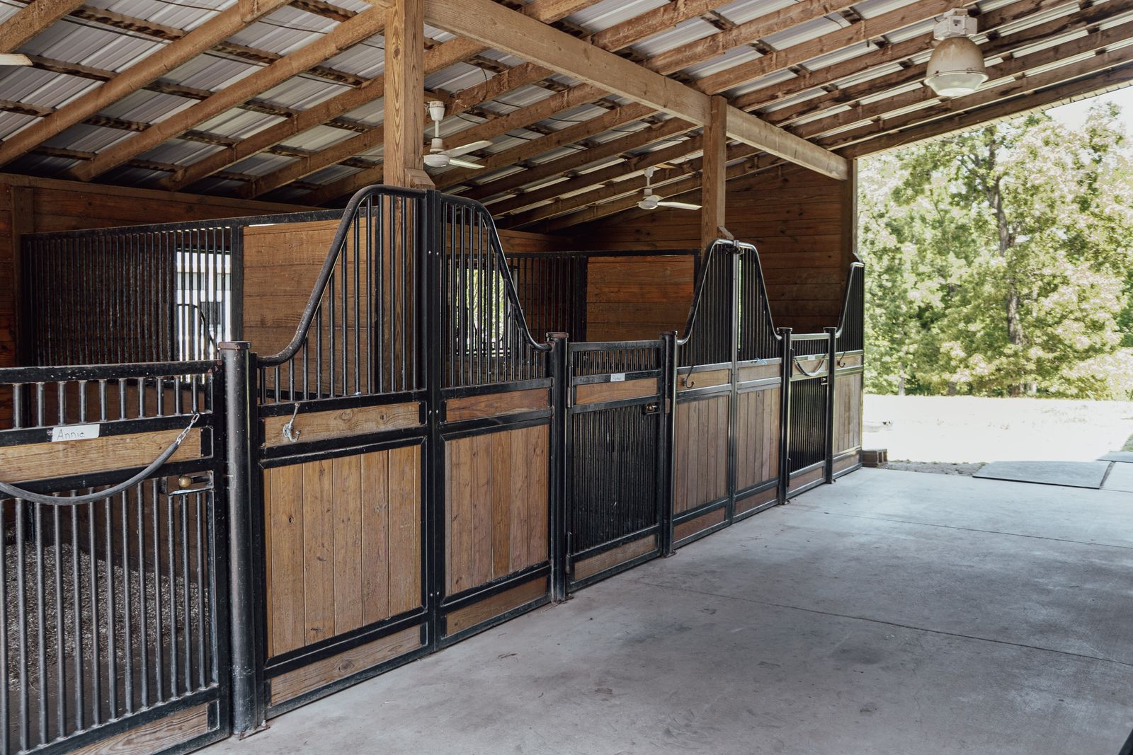 Stall interior with wood and ironwork detail